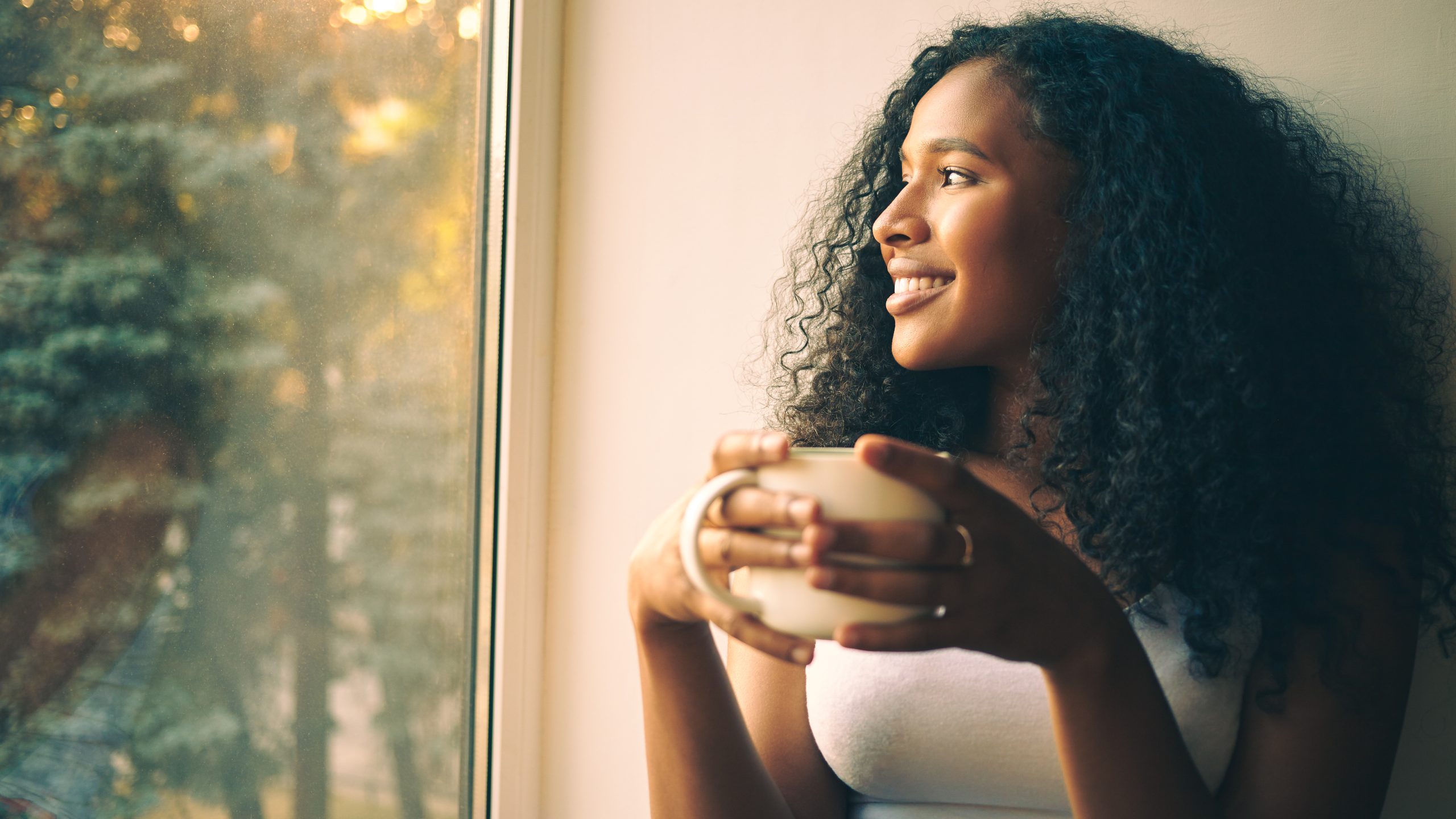 Morning routine. Portrait of happy charming young mixed race fem